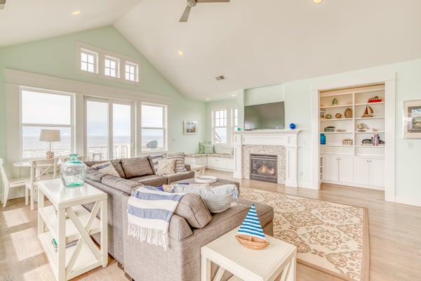 Living Room with fireplace and television